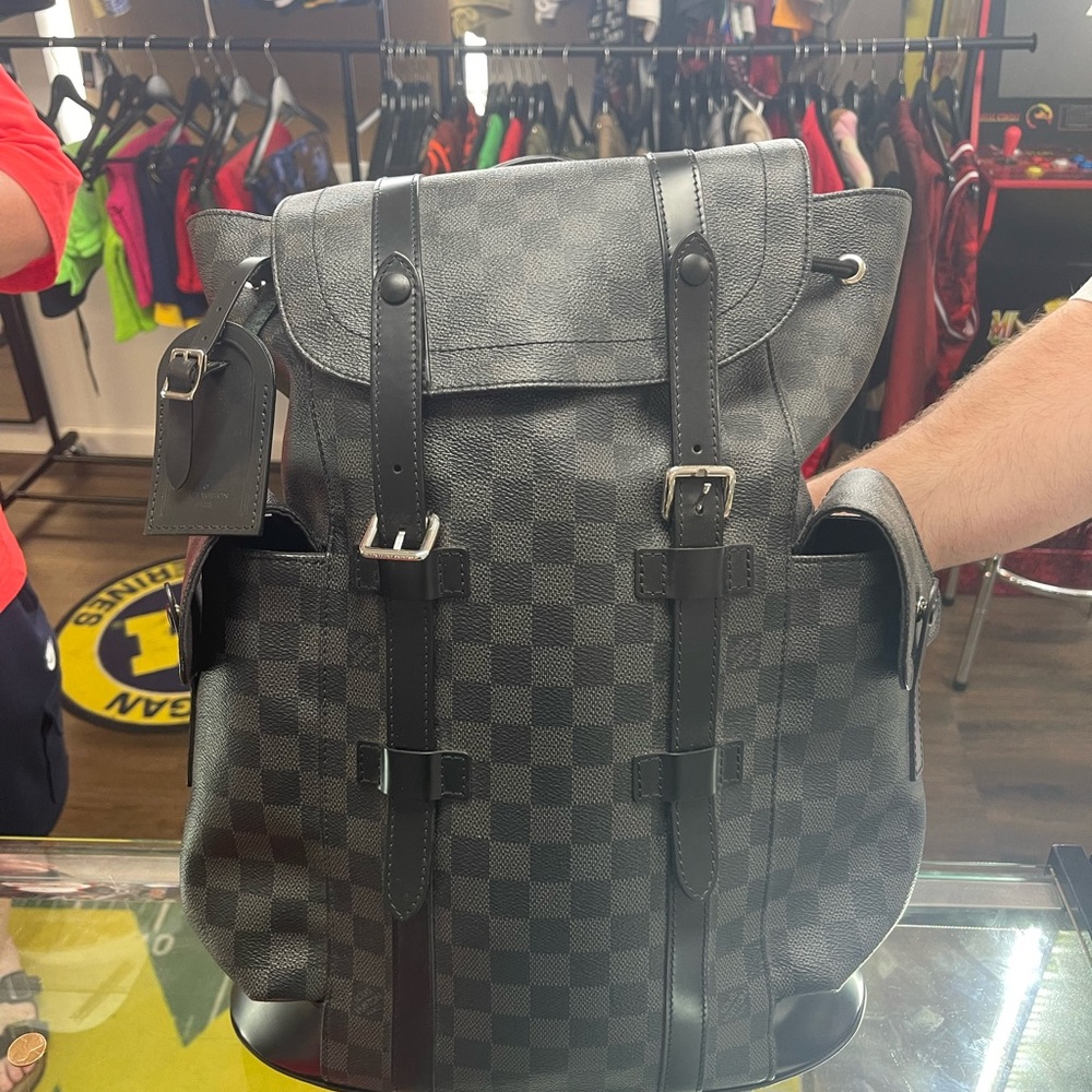 Black Tactical Backpack with Adjustable Straps and Durable Fabric